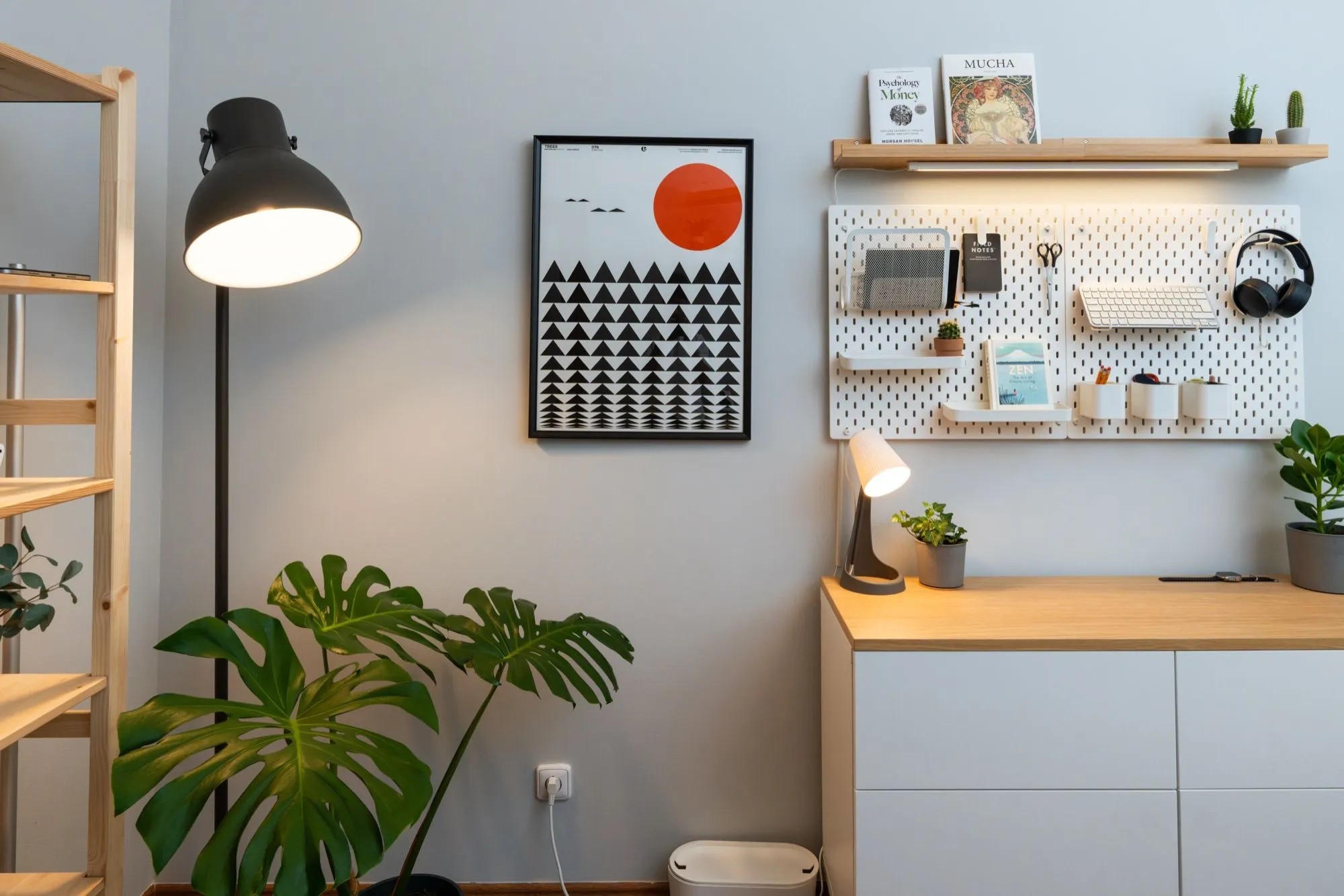 Shelf and pegboard next to the desk